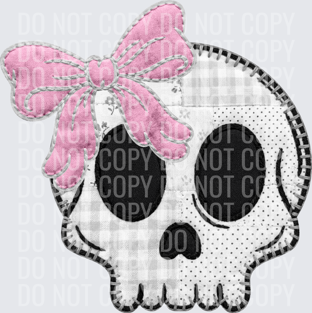 Stitched skull head with bow